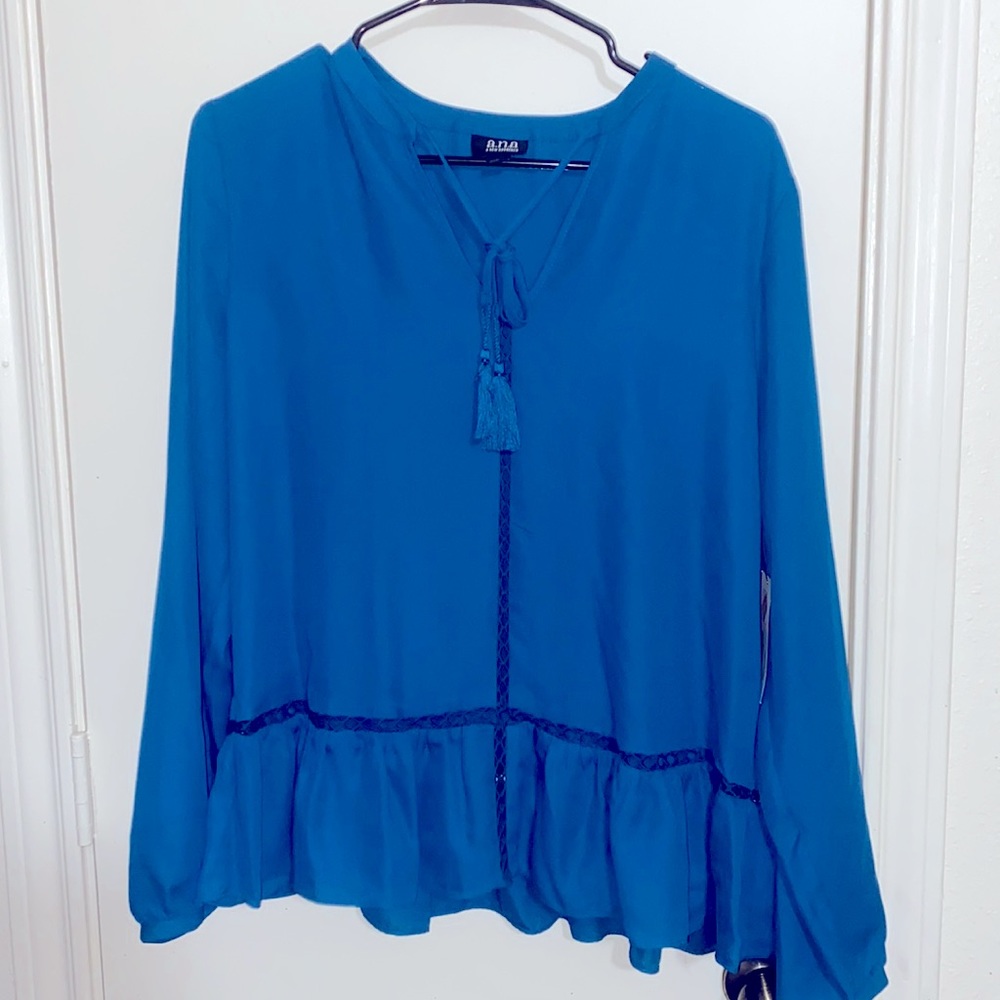 Brand new blouse. Perfect for in the office or a night out